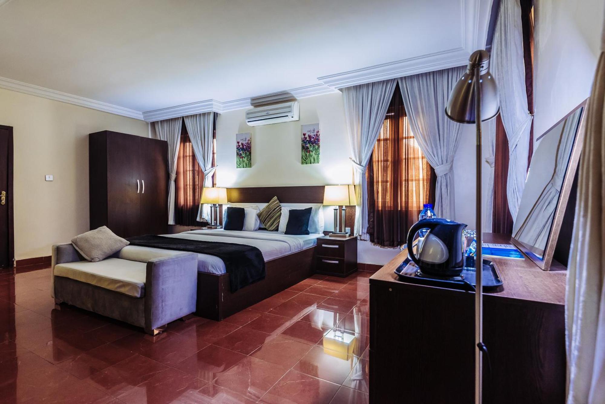 Tranquil Mews Hotel Jabi Bagian luar foto