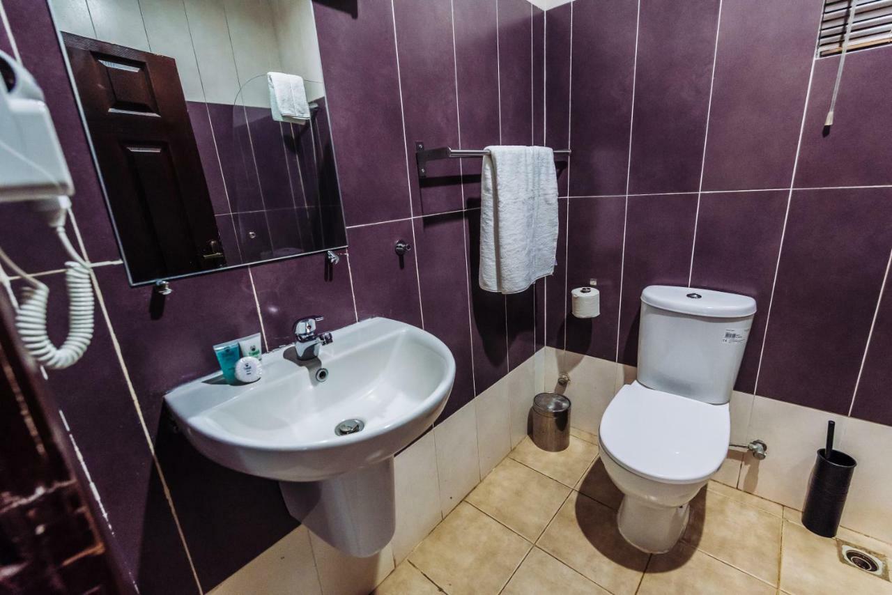 Tranquil Mews Hotel Jabi Bagian luar foto