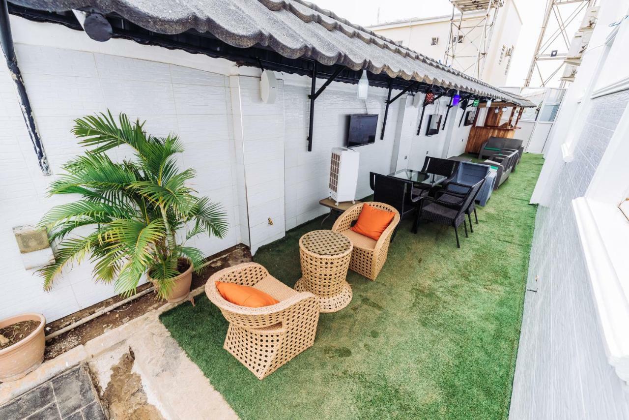 Tranquil Mews Hotel Jabi Bagian luar foto